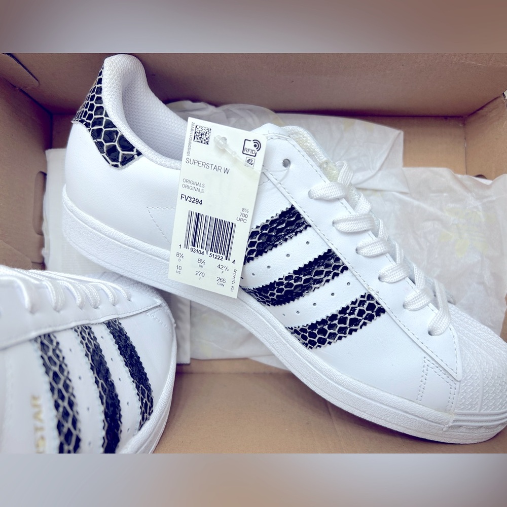 Adidas original superstars in black and white snake print. **NWWT